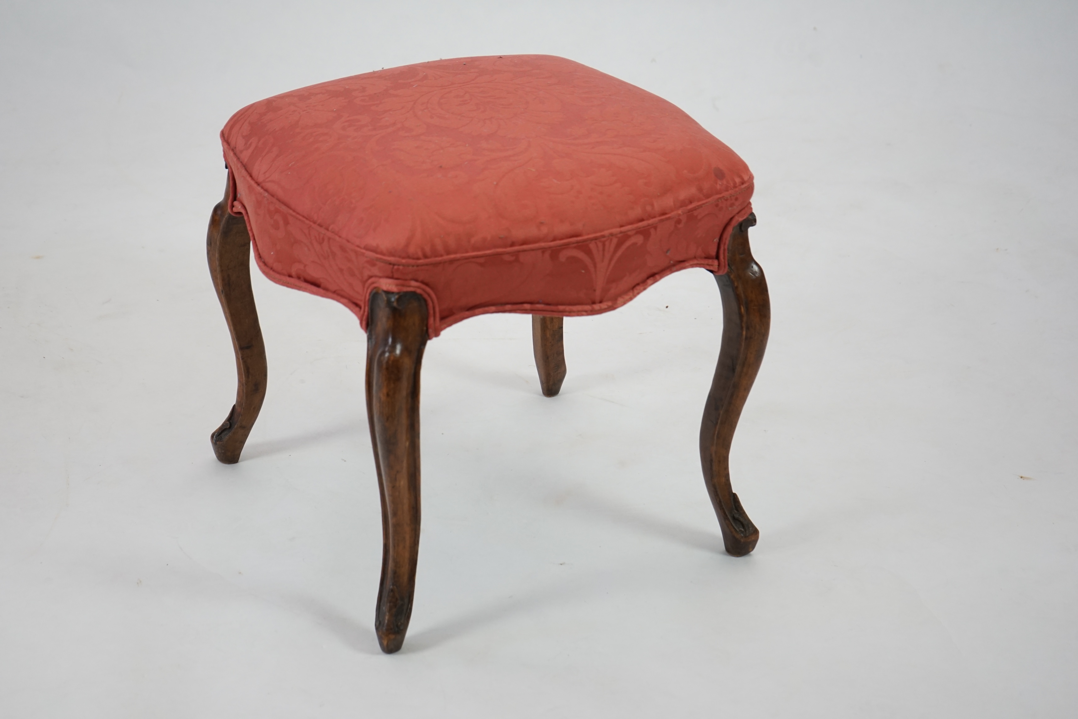 A Victorian mahogany dressing stool